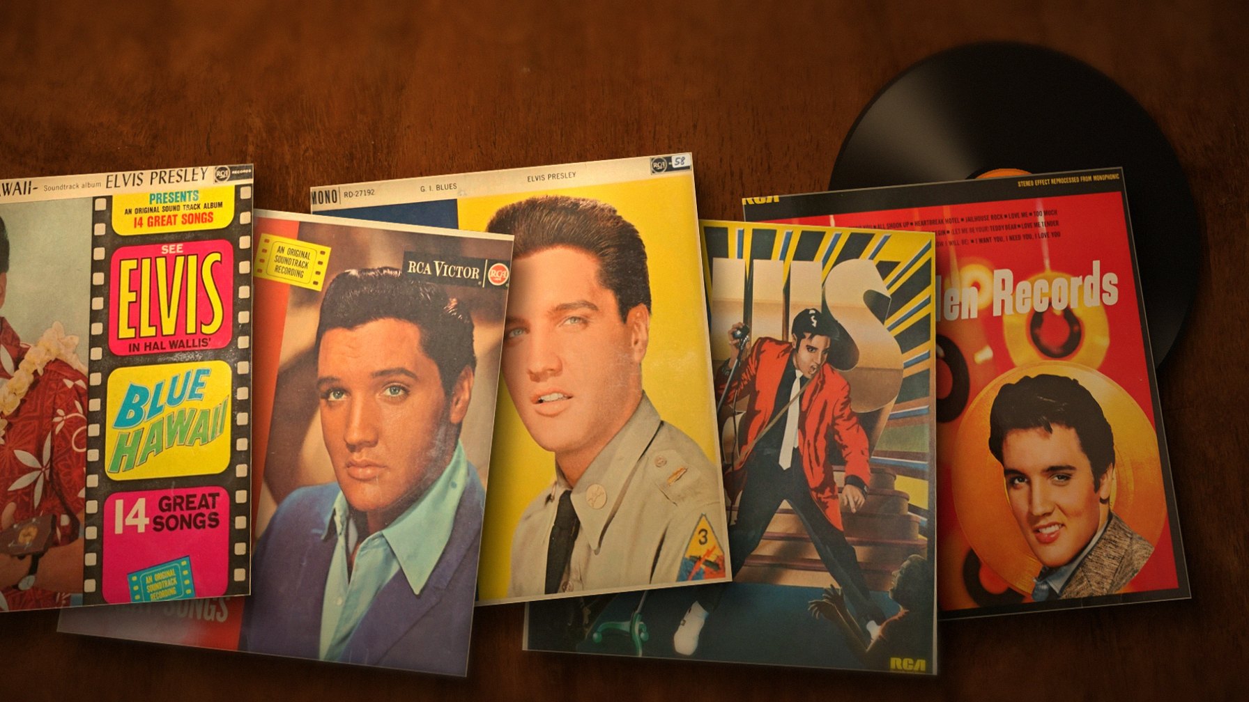 Original Elvis Presley LP sleeves from the WholelottaVinyl crates, including Blue Hawaii, Girls! Girls! Girls! and G.I. Blues, fanned out on a wooden counter