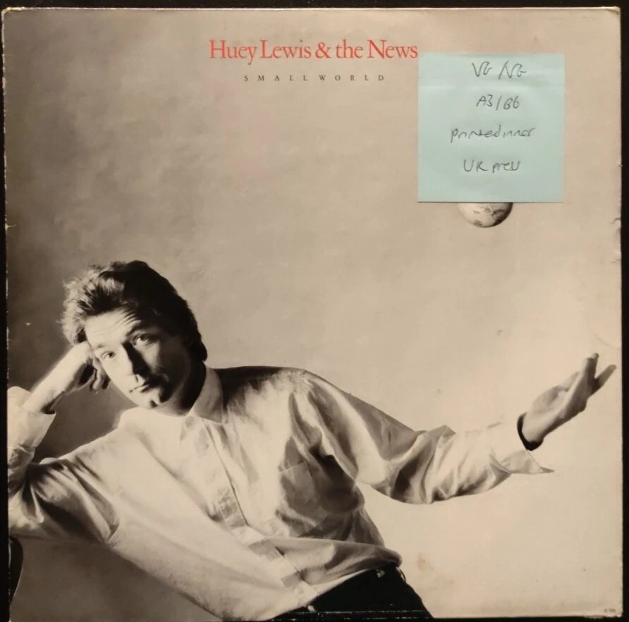 Huey Lewis and the News Small World Vinyl Record LP VG/VG CDL1622 1988 sleeve Huey Lewis and the News Small World Vinyl Record LP VG/VG CDL1622 1988 sleeve