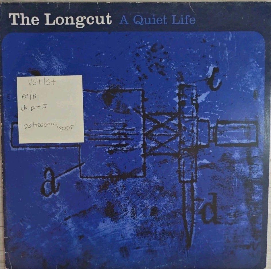 The Longcut A Quiet Life Vinyl Record 12" VG+/G+ DLTLP035 2005 sleeve The Longcut A Quiet Life Vinyl Record 12" VG+/G+ DLTLP035 2005 sleeve