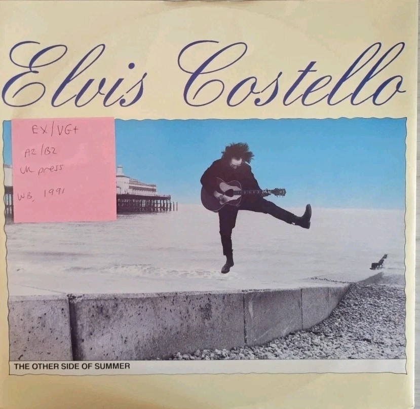 Elvis Costello The Other Side Of Summer Vinyl Record 12" EX/VG+ W0025T 1991 sleeve Elvis Costello The Other Side Of Summer Vinyl Record 12" EX/VG+ W0025T 1991 sleeve