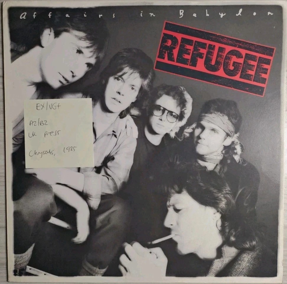 Refugee Affairs In Babylon Vinyl Record LP EX/VG+ CHR1493 1985 sleeve Refugee Affairs In Babylon Vinyl Record LP EX/VG+ CHR1493 1985 sleeve