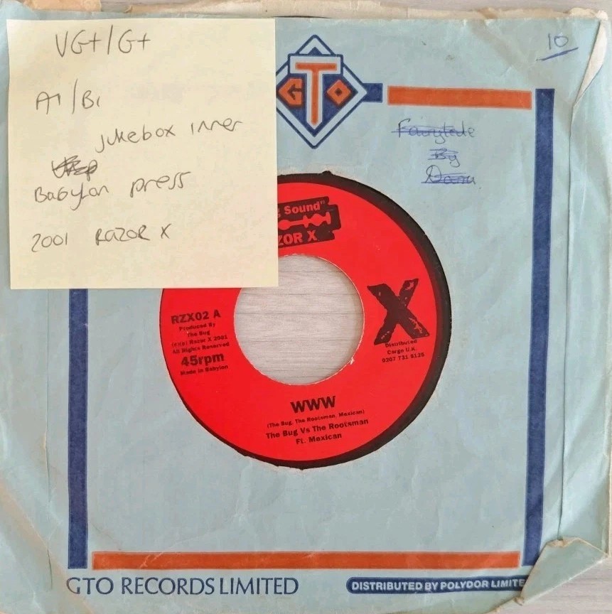 The Bug Vs The Roots man WWW/Version Vinyl Record 7" VG+/G+ RZXO2 sleeve The Bug Vs The Roots man WWW/Version Vinyl Record 7" VG+/G+ RZXO2 sleeve