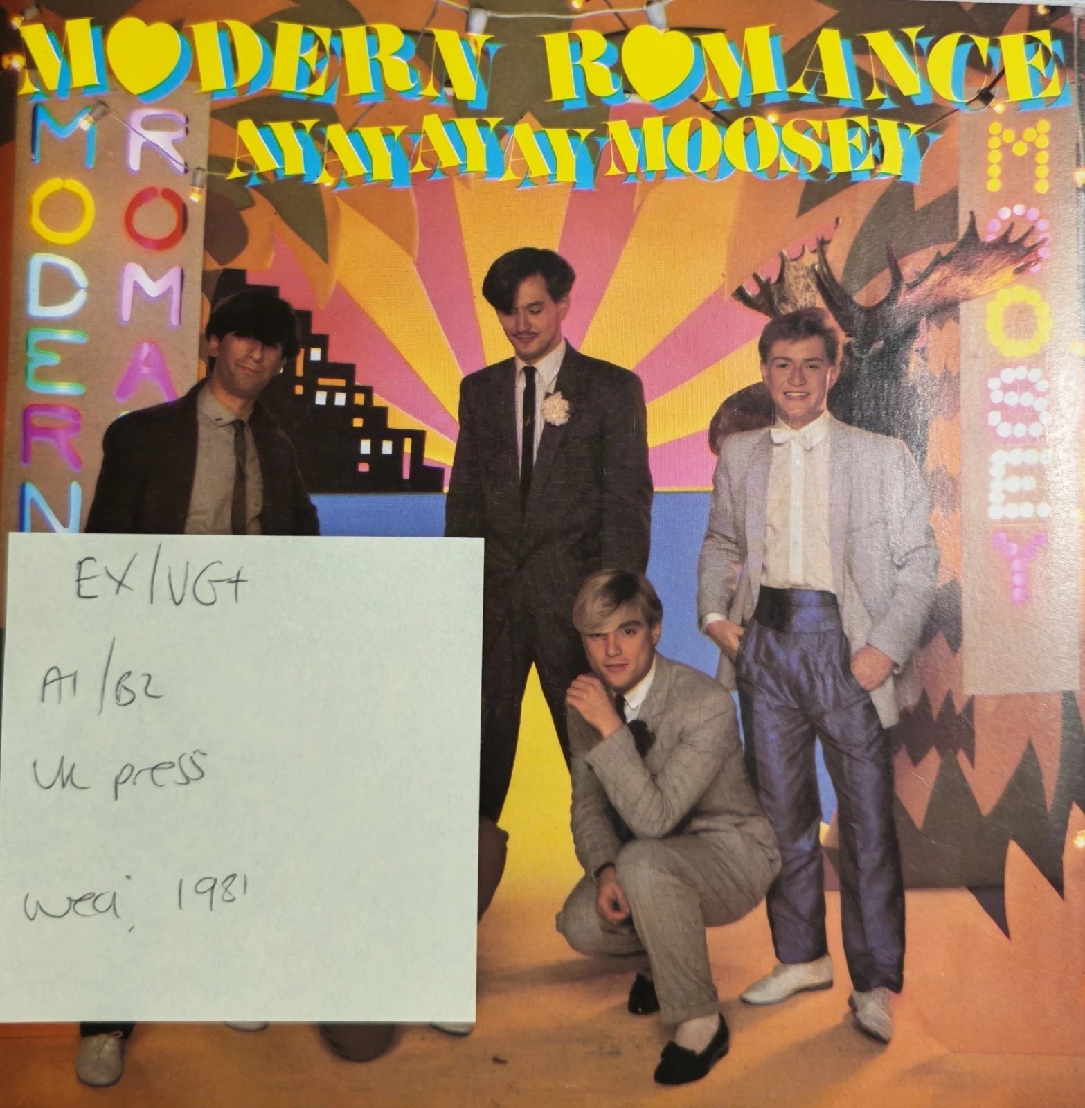Modern Romance Ay Ay Ay Ay Moosey Vinyl Record 7" EX/VG+ WEA K18883 1981 sleeve Modern Romance Ay Ay Ay Ay Moosey Vinyl Record 7" EX/VG+ WEA K18883 1981 sleeve