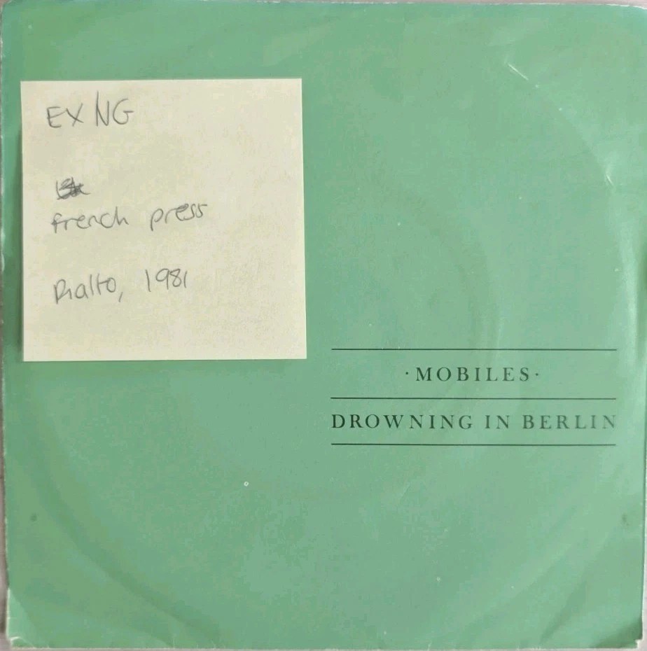 Mobiles Drowning In Berlin Vinyl Record 7" EX/VG RIA3 1981 sleeve Mobiles Drowning In Berlin Vinyl Record 7" EX/VG RIA3 1981 sleeve