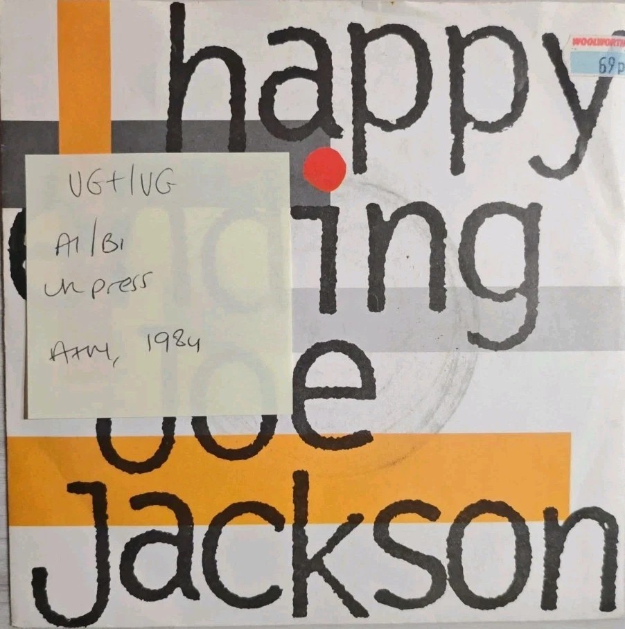 Joe Jackson Happy Ending Vinyl Record 7" VG+/VG AM 186 1984 vinyl record sleeve Joe Jackson Happy Ending Vinyl Record 7" VG+/VG AM 186 1984 vinyl record sleeve