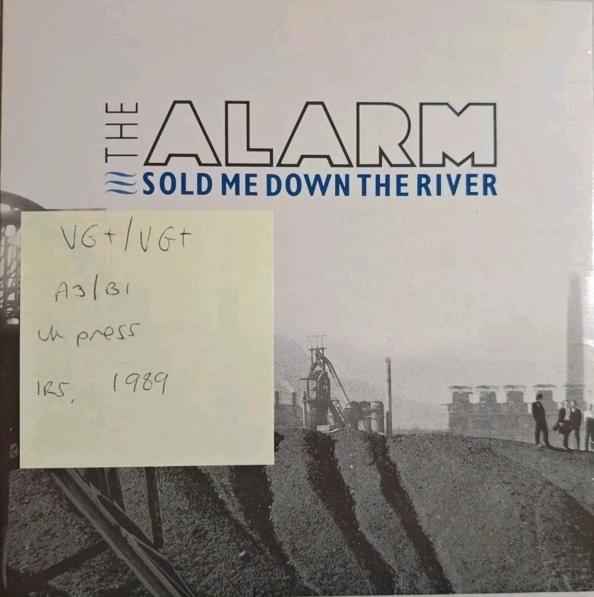 The Alarm Sold Me Down The River Vinyl Record 7" VG+/VG+ EIRS123 1989 vinyl record sleeve The Alarm Sold Me Down The River Vinyl Record 7" VG+/VG+ EIRS123 1989 vinyl record sleeve