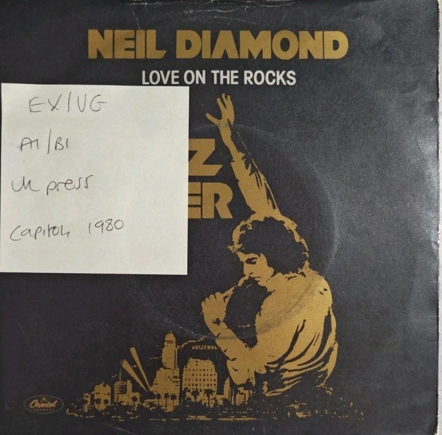 Neil Diamond Love On The Rocks Vinyl Record 7" EX/VG CL 16173 1980 sleeve Neil Diamond Love On The Rocks Vinyl Record 7" EX/VG CL 16173 1980 sleeve