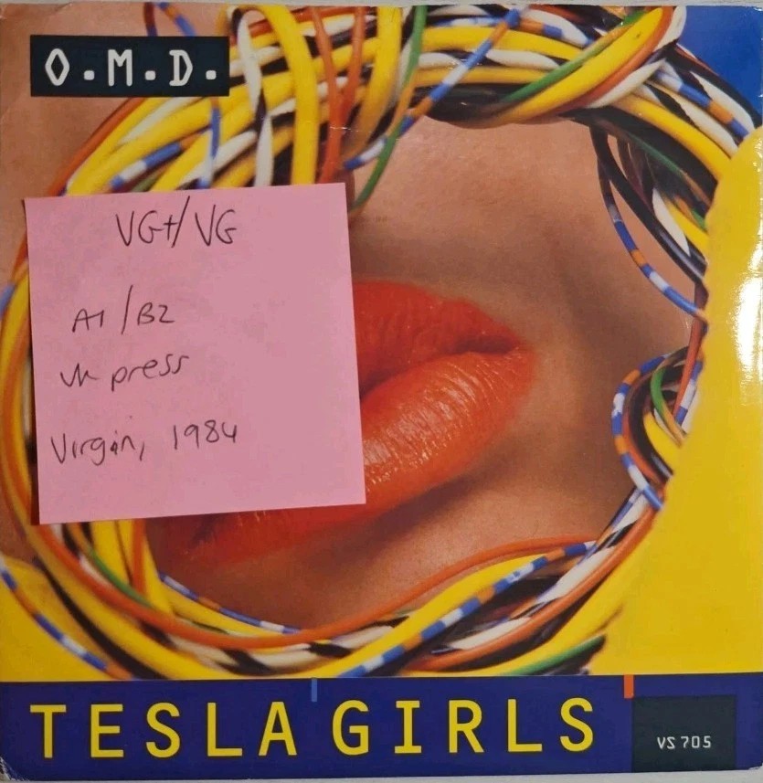 Orchestral Manoeuvres In The Dark Tesla Girls Vinyl Record 7" VG+/VG VS 705 1984 vinyl record sleeve Orchestral Manoeuvres In The Dark Tesla Girls Vinyl Record 7" VG+/VG VS 705 1984 vinyl record sleeve
