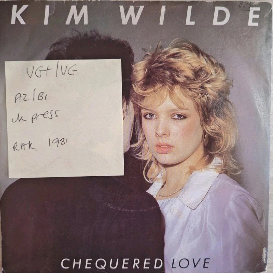 Kim Wilde Chequered Love Vinyl Record 7" VG+/VG RAK 330 sleeve Kim Wilde Chequered Love Vinyl Record 7" VG+/VG RAK 330 sleeve