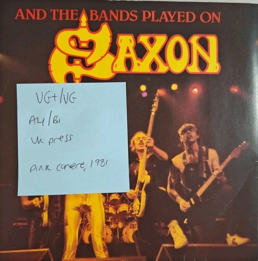 Saxon And The Bands Played On Vinyl Record 7" VG+/VG CAR 180 1981 vinyl record sleeve Saxon And The Bands Played On Vinyl Record 7" VG+/VG CAR 180 1981 vinyl record sleeve