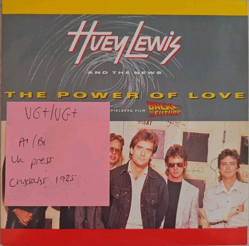 Huey Lewis & The News The Power of Love Vinyl Record 7" VG+/VG+ HUEY1 1985 sleeve Huey Lewis & The News The Power of Love Vinyl Record 7" VG+/VG+ HUEY1 1985 sleeve