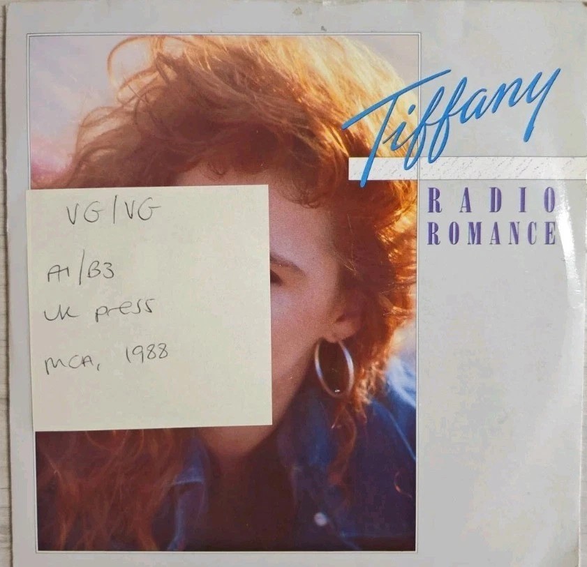 Tiffany Radio Romance / Can't Stop A Heartbeat Vinyl Record 7" VG/VG TIFF5 sleeve Tiffany Radio Romance / Can't Stop A Heartbeat Vinyl Record 7" VG/VG TIFF5 sleeve