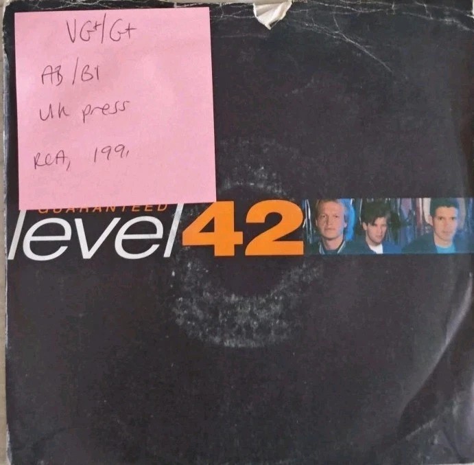 Level 42 Guaranteed Vinyl Record 7" VG+/G+ PB 44745 1991 sleeve Level 42 Guaranteed Vinyl Record 7" VG+/G+ PB 44745 1991 sleeve