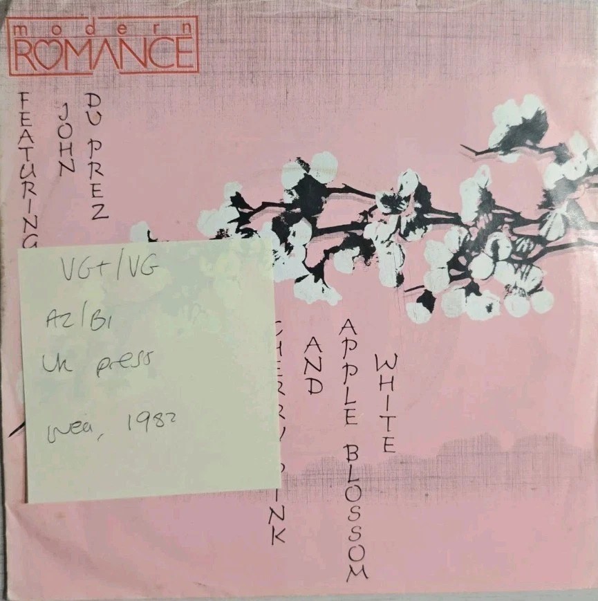 Modern Romance Cherry Pink And Apple Blossom White Vinyl Record 7" VG+/VG K19245 sleeve Modern Romance Cherry Pink And Apple Blossom White Vinyl Record 7" VG+/VG K19245 sleeve