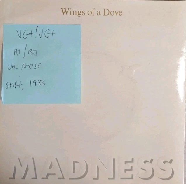 Madness Wings Of A Dove Vinyl Record 7" VG+/VG+ BUY181 1983 vinyl record sleeve Madness Wings Of A Dove Vinyl Record 7" VG+/VG+ BUY181 1983 vinyl record sleeve