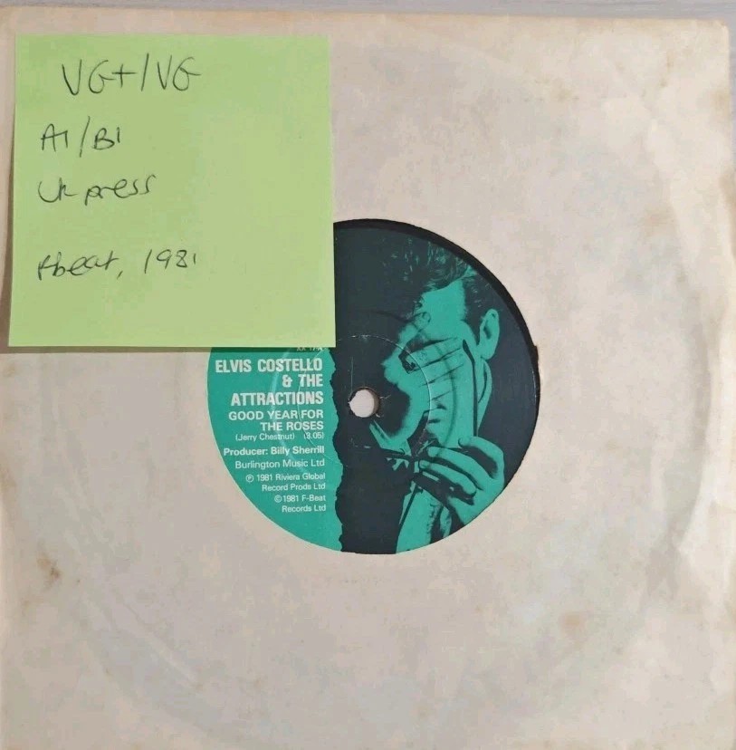 Elvis Costello & The Attractions Good Year For Roses Vinyl Record 7" VG+/VG XX17 sleeve Elvis Costello & The Attractions Good Year For Roses Vinyl Record 7" VG+/VG XX17 sleeve