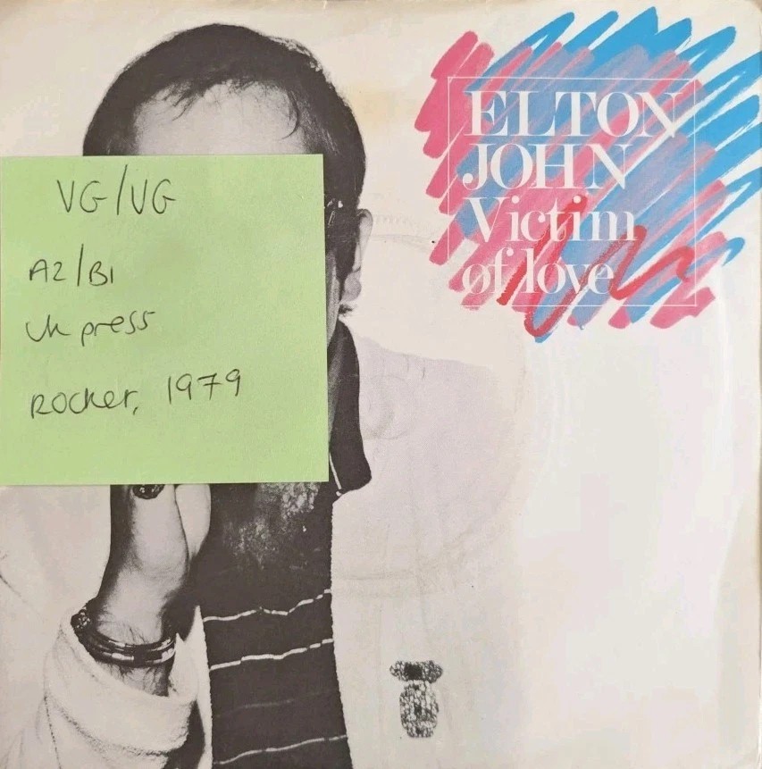 Elton John Victim Of Love Vinyl Record 7" VG/VG XPRES 21 1979 sleeve Elton John Victim Of Love Vinyl Record 7" VG/VG XPRES 21 1979 sleeve