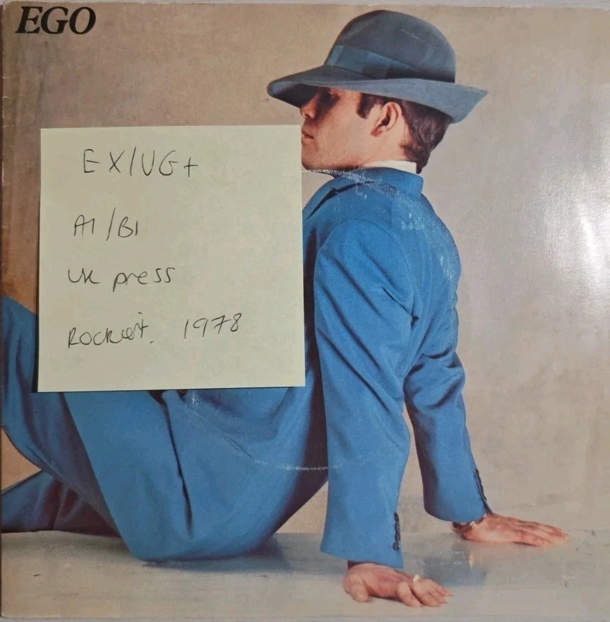 Elton John Ego / Flinstone Boy - Vinyl Record 7" EX/VG+ ROKN 538 sleeve Elton John Ego / Flinstone Boy - Vinyl Record 7" EX/VG+ ROKN 538 sleeve