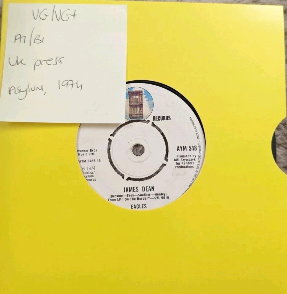 Eagles Lyin' Eyes / James Dean Vinyl Record 7" VG/VG+ AYM548 1974 sleeve Eagles Lyin' Eyes / James Dean Vinyl Record 7" VG/VG+ AYM548 1974 sleeve