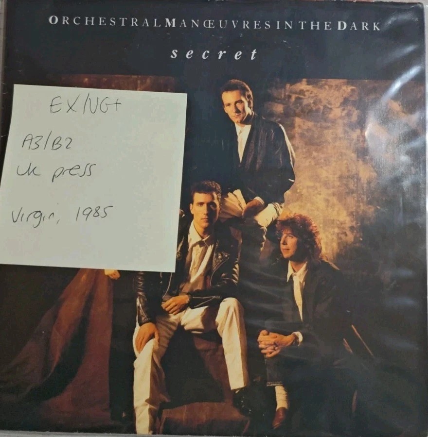 Orchestral Manoeuvres In The Dark Secret Vinyl Record 7" EX/VG+ VS 796 vinyl record sleeve Orchestral Manoeuvres In The Dark Secret Vinyl Record 7" EX/VG+ VS 796 vinyl record sleeve