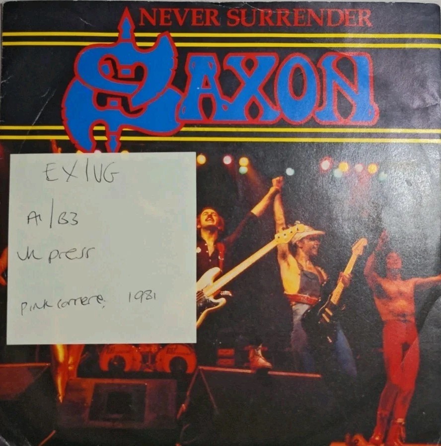 Saxon Never Surrender Vinyl Record 7" EX/VG CAR 204 1981 vinyl record sleeve Saxon Never Surrender Vinyl Record 7" EX/VG CAR 204 1981 vinyl record sleeve