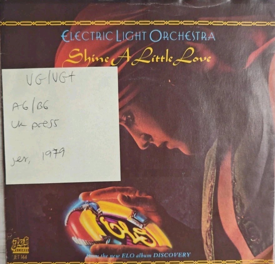 ELO Shine A Little Love / Jungle Vinyl Record 7" VG/VG+ JET144 1979 sleeve ELO Shine A Little Love / Jungle Vinyl Record 7" VG/VG+ JET144 1979 sleeve
