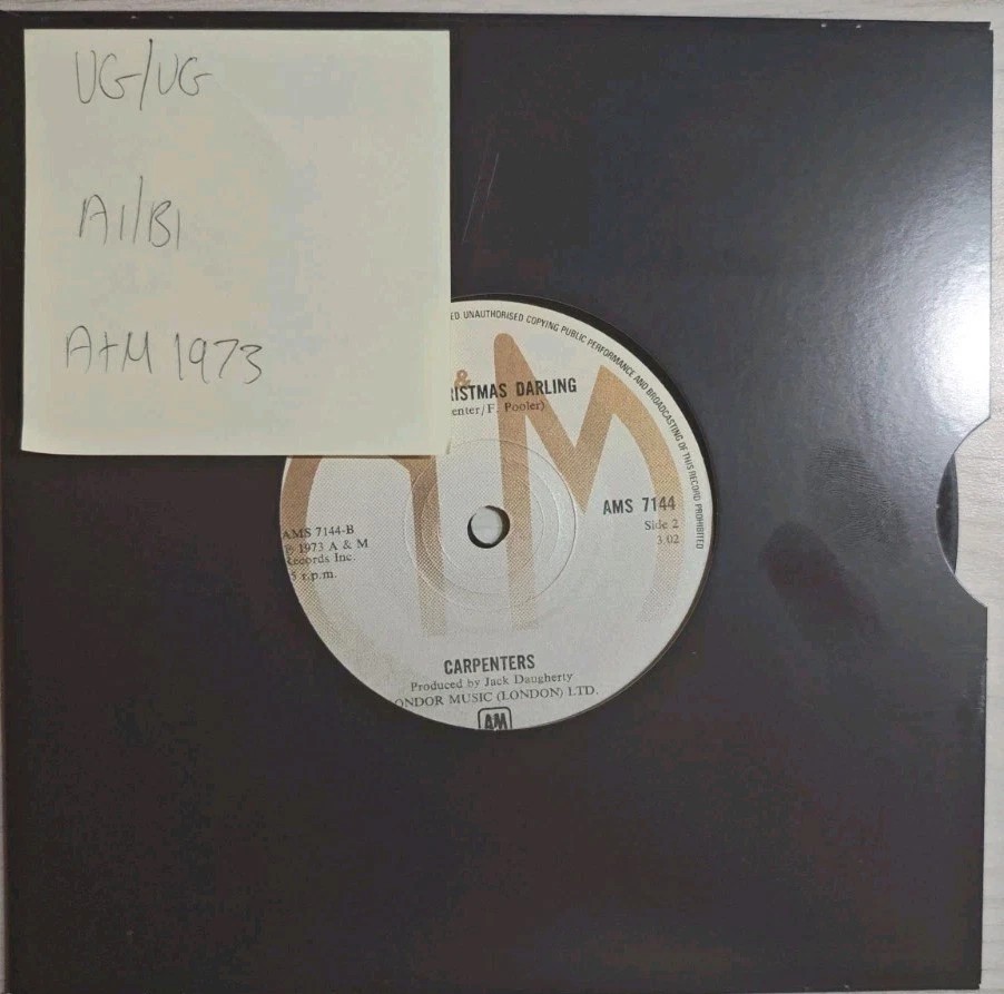 Carpenters Santa Claus is Coming to Town Vinyl Record 7" VG/VG AMS 7144 1973 sleeve Carpenters Santa Claus is Coming to Town Vinyl Record 7" VG/VG AMS 7144 1973 sleeve