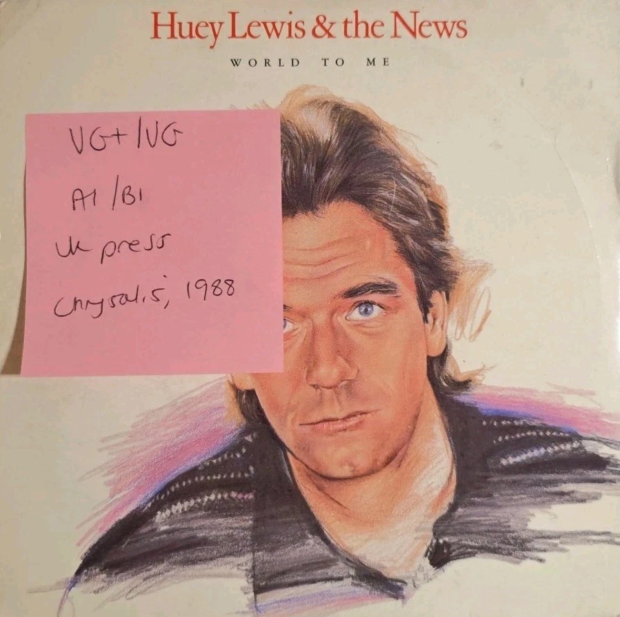 Huey Lewis The New World To Me Vinyl Record 7" VG+/VG HUEY12 1988 sleeve Huey Lewis The New World To Me Vinyl Record 7" VG+/VG HUEY12 1988 sleeve