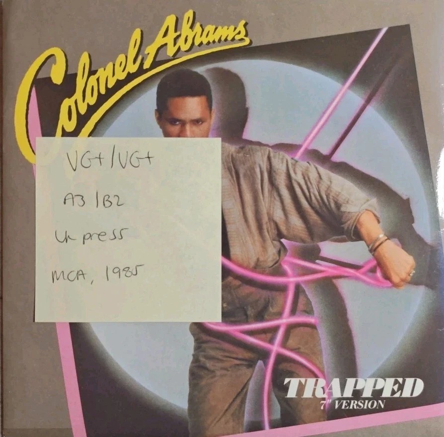 Colonel Abrams Trapped Vinyl Record 7" VG+/VG+ MCA997 1985 sleeve Colonel Abrams Trapped Vinyl Record 7" VG+/VG+ MCA997 1985 sleeve