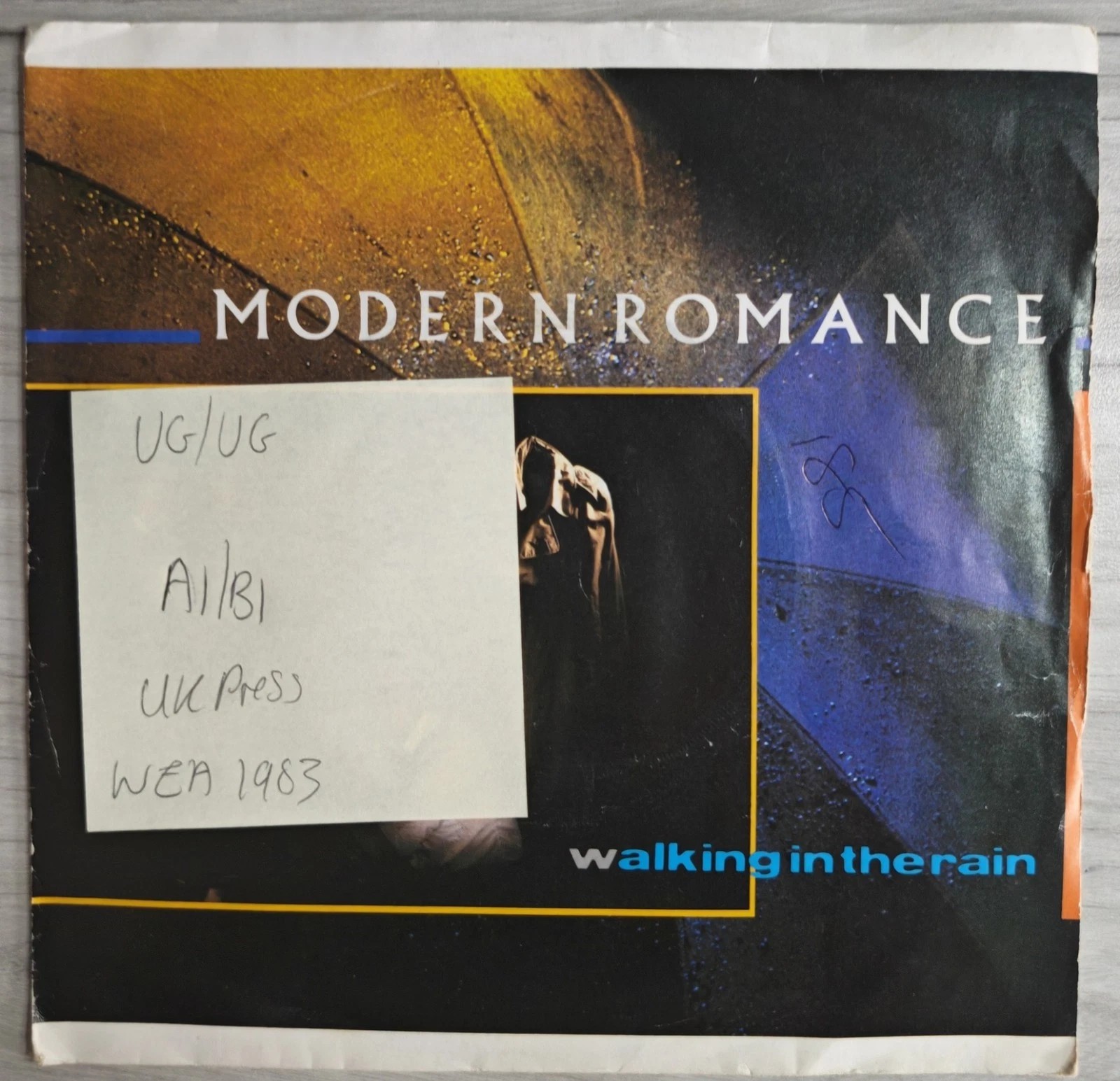 Modern Romance Walking In The Rain Vinyl Record 7" VG/VG X9733 1983 sleeve Modern Romance Walking In The Rain Vinyl Record 7" VG/VG X9733 1983 sleeve