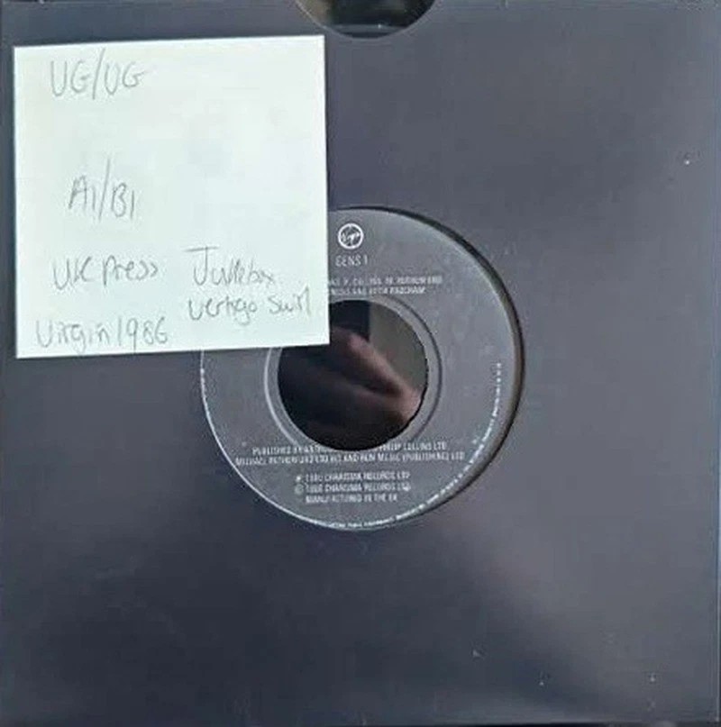 Genesis Invisible Touch Vinyl Record 7" VG/VG GENS 1 1986 sleeve Genesis Invisible Touch Vinyl Record 7" VG/VG GENS 1 1986 sleeve