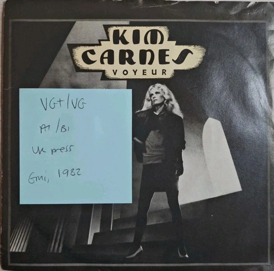 Kim Carnes Voyeur Vinyl Record 7" VG+/VG EA143 1982 sleeve Kim Carnes Voyeur Vinyl Record 7" VG+/VG EA143 1982 sleeve