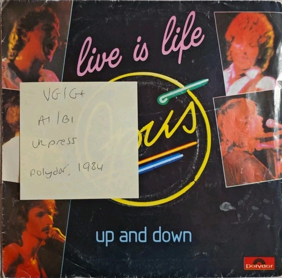 Opus Live Is Life Vinyl Record 7" VG/G+ POSP743 1984 sleeve Opus Live Is Life Vinyl Record 7" VG/G+ POSP743 1984 sleeve