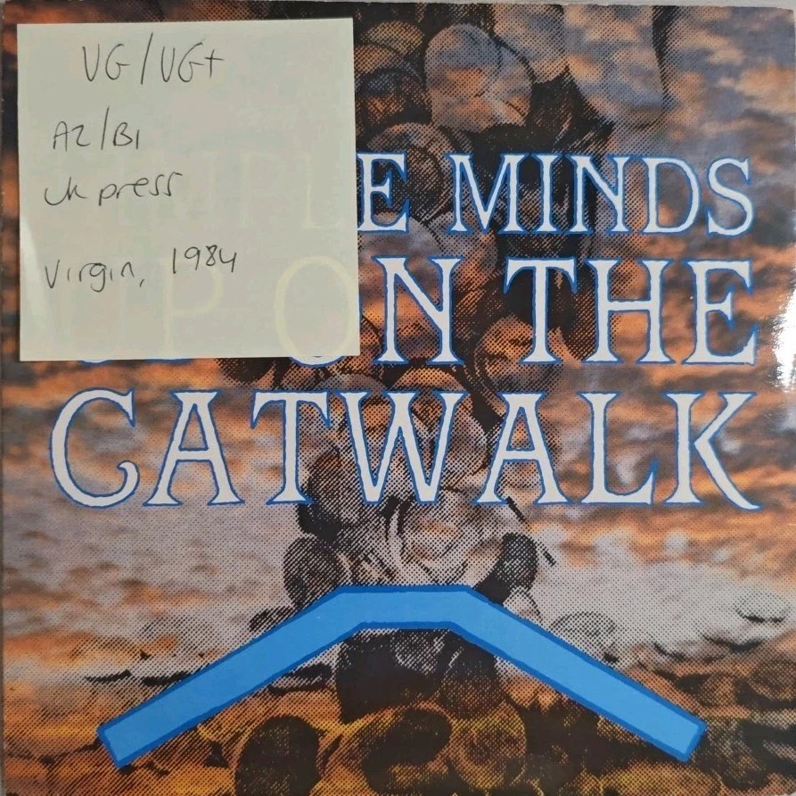 Simple Minds Up On The Catwalk Vinyl Record 7" VG/VG+ VS661 1984 sleeve Simple Minds Up On The Catwalk Vinyl Record 7" VG/VG+ VS661 1984 sleeve