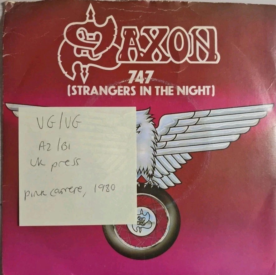 Saxon 747 Strangers In The Night Vinyl Record 12" VG/VG CAR 151T 1980 sleeve Saxon 747 Strangers In The Night Vinyl Record 12" VG/VG CAR 151T 1980 sleeve