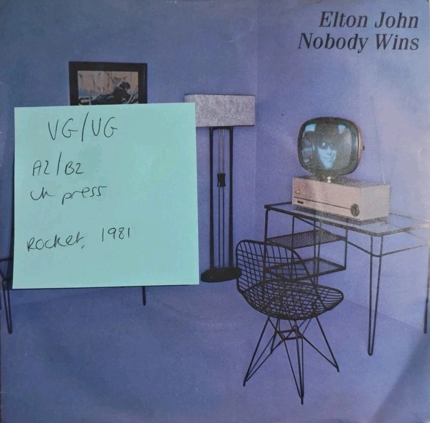 Elton John Nobody Wins Vinyl Record 7" VG/VG XPRES 54 1981 vinyl record sleeve Elton John Nobody Wins Vinyl Record 7" VG/VG XPRES 54 1981 vinyl record sleeve