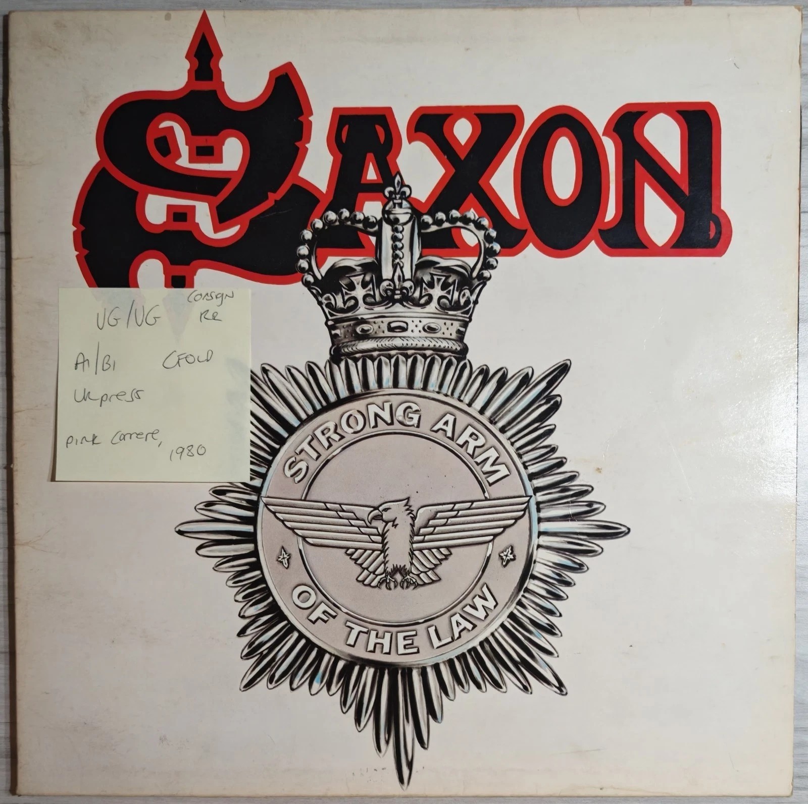 Saxon Strong Arm Of The Law Vinyl Record LP VG/VG CAL 120 1980 vinyl record sleeve Saxon Strong Arm Of The Law Vinyl Record LP VG/VG CAL 120 1980 sleeve