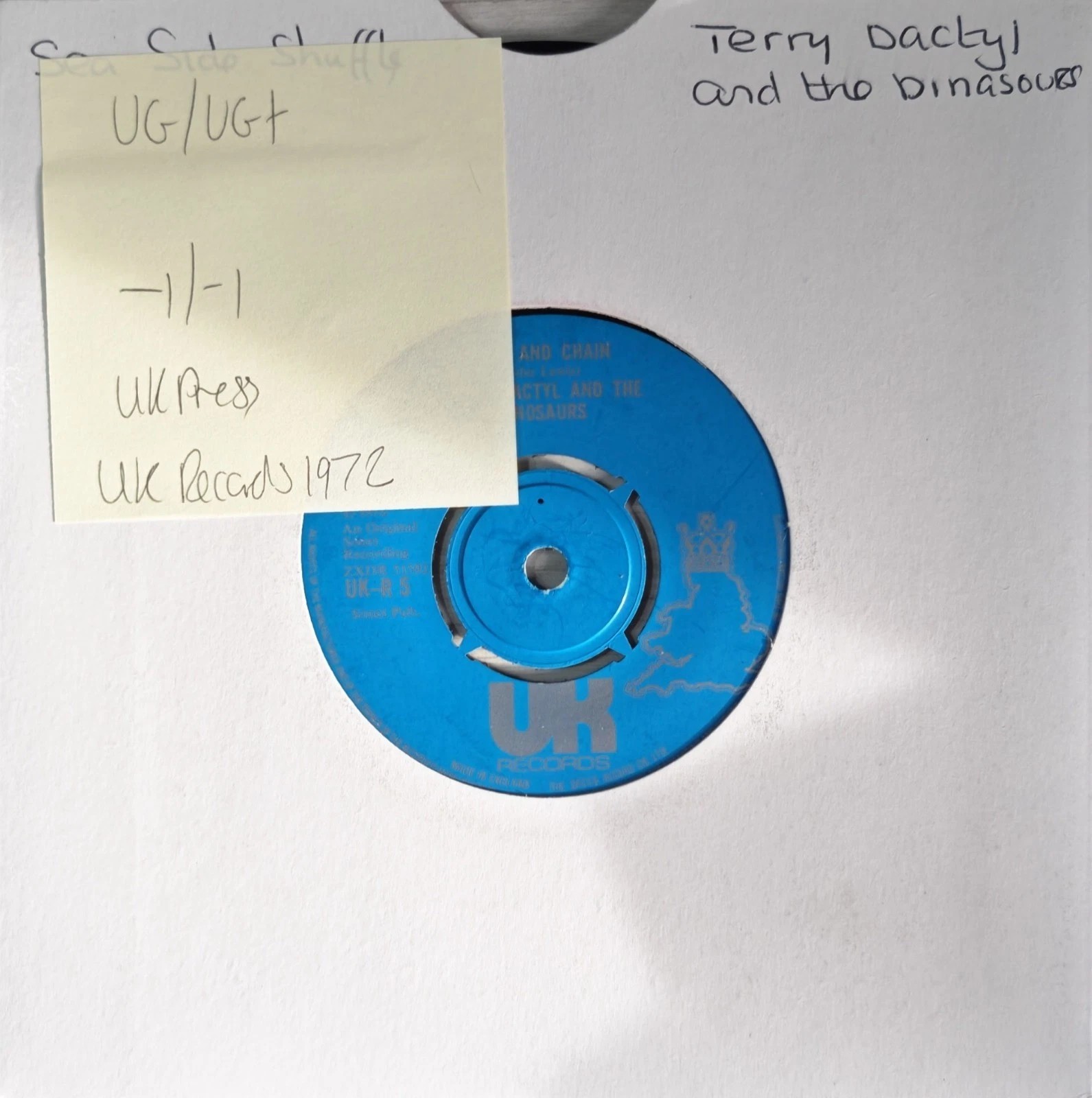 Terry Dactyl And The Dinosaurs Seaside Shuffle Vinyl Record 7" VG/VG+ UK5 1972 vinyl record sleeve Terry Dactyl And The Dinosaurs Seaside Shuffle Vinyl Record 7" VG/VG+ UK5 1972 vinyl record sleeve