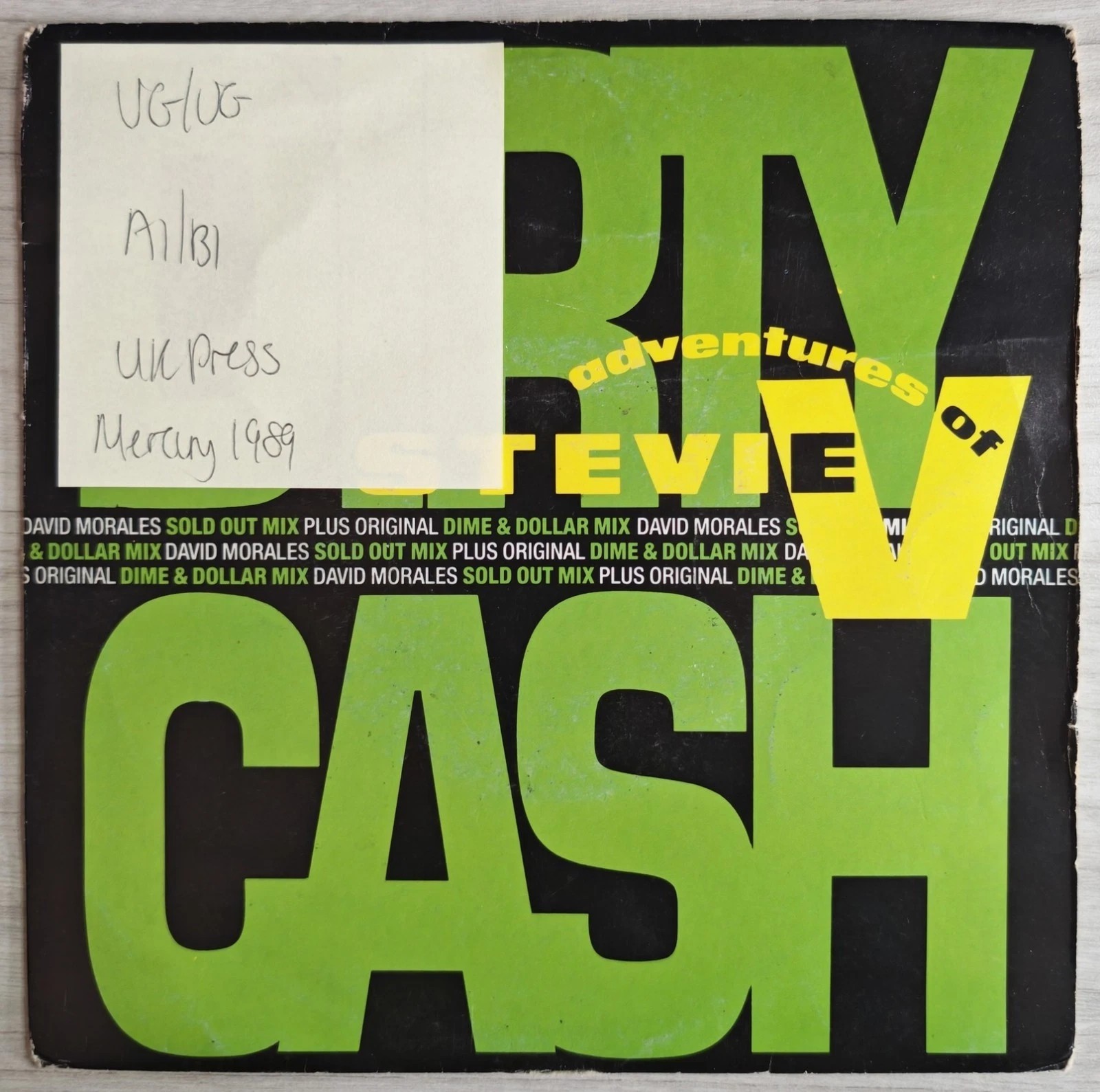 The Adventures Of Stevie V Dirty Cash Vinyl Record 7" VG/VG MERR 311 1990 vinyl record sleeve The Adventures Of Stevie V Dirty Cash Vinyl Record 7" VG/VG MERR 311 1990 vinyl record sleeve