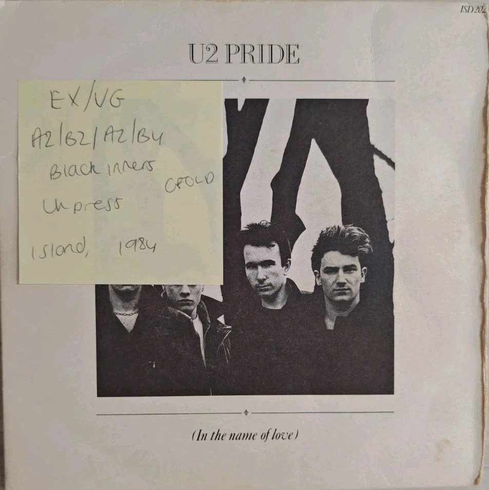U2 Pride Vinyl Record EX/VG ISD 202 1984 vinyl record sleeve U2 Pride Vinyl Record EX/VG ISD 202 1984 vinyl record sleeve