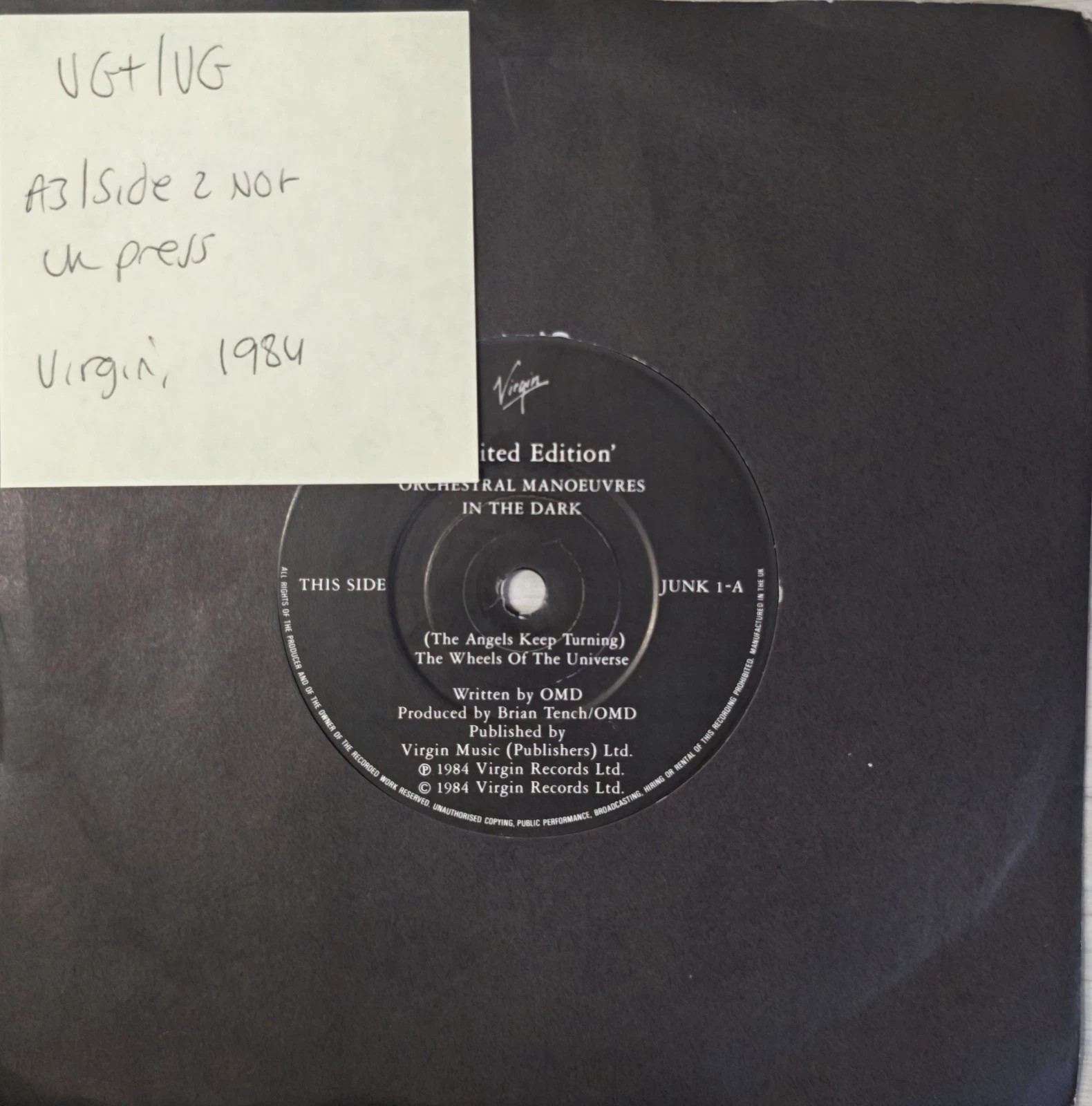 OMD The Angels Keep Turning The Wheels Of The Universe Vinyl Record VG+/VG JUNK1 vinyl record sleeve OMD The Angels Keep Turning The Wheels Of The Universe Vinyl Record VG+/VG JUNK1 vinyl record sleeve